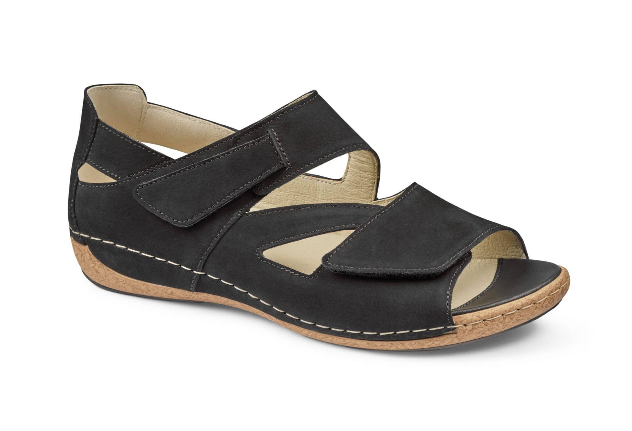 Komfortabel svart sandal med justerbara remmar och korksula för kvinnor.