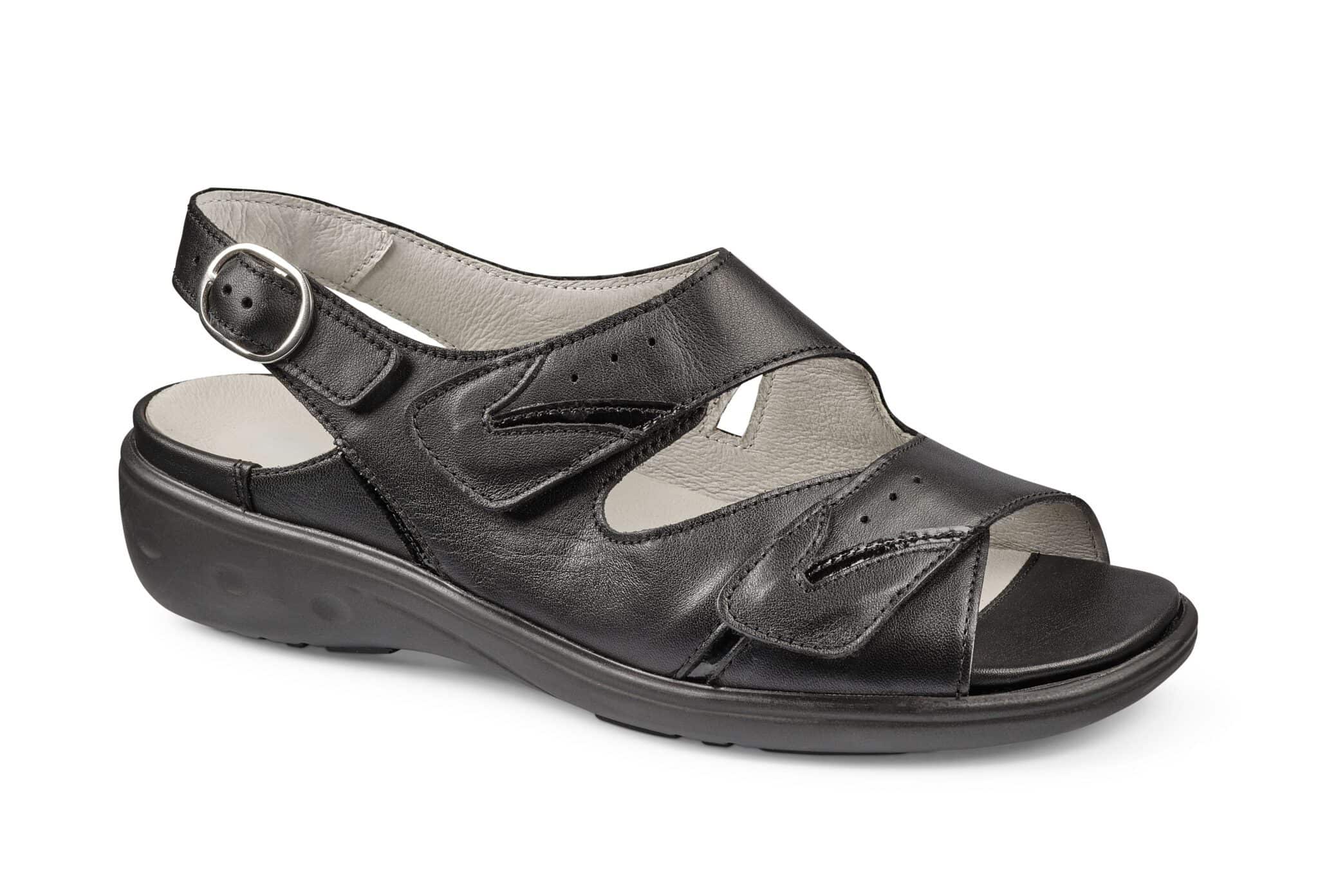 Komfortabel svart sandal med justerbar rem och gummisula för kvinnor.