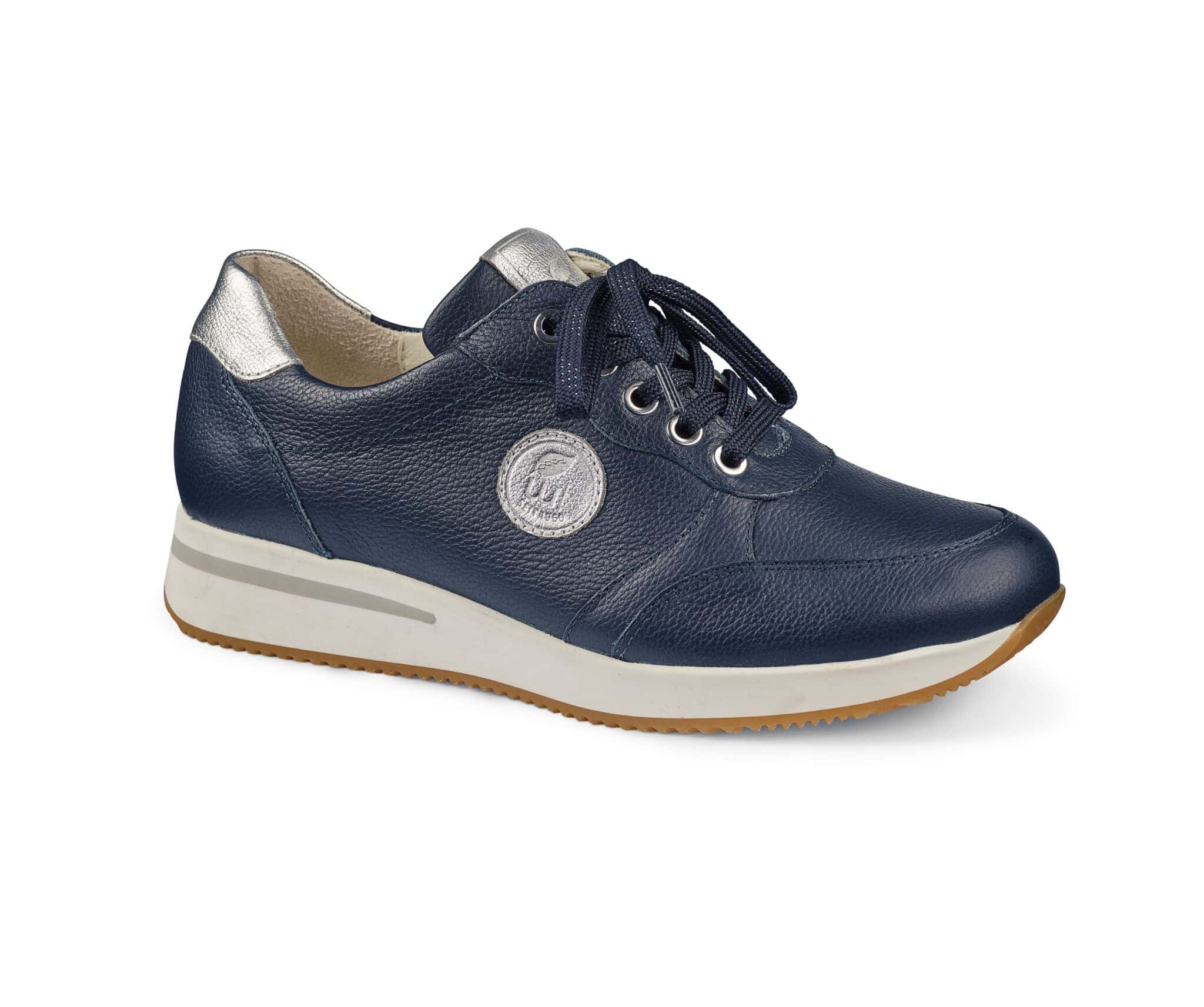 Dam sneakers i navyblått med silverdetaljer och vit sula.