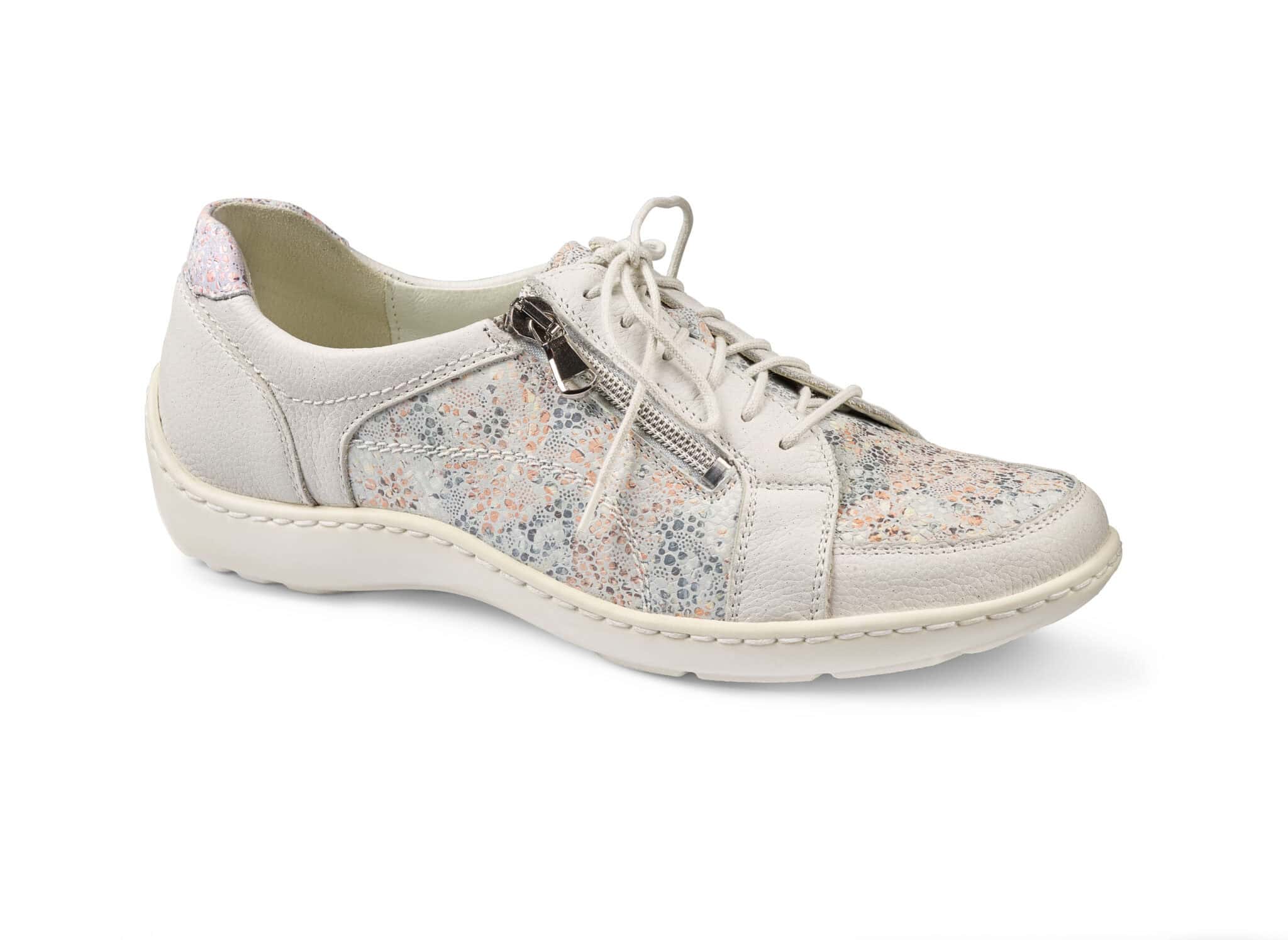 Dam sneakers i ljus färg med blommönster och sidoförstärkning.