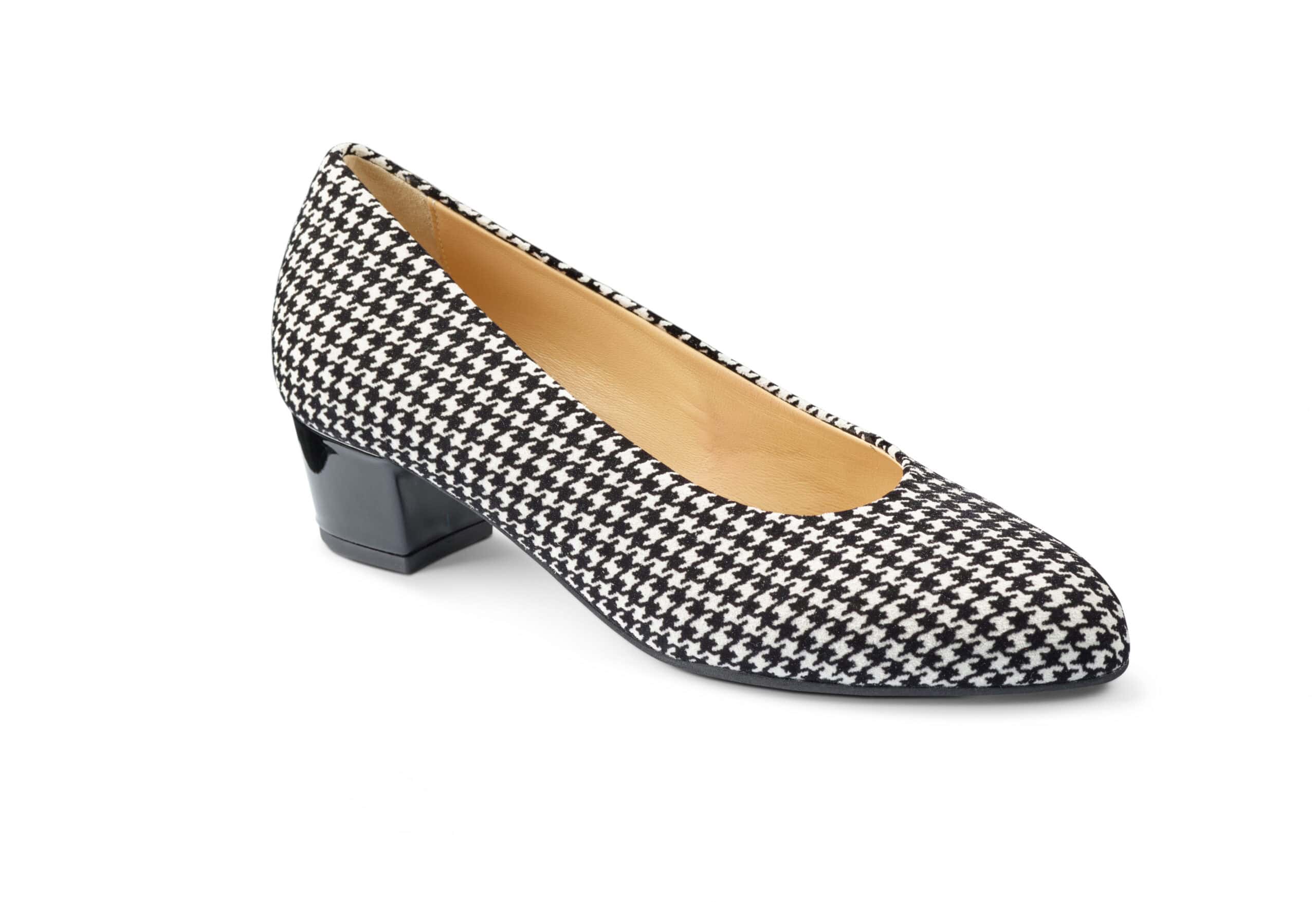 Damtoffel med svartvitt houndstooth-mönster och låg klack.