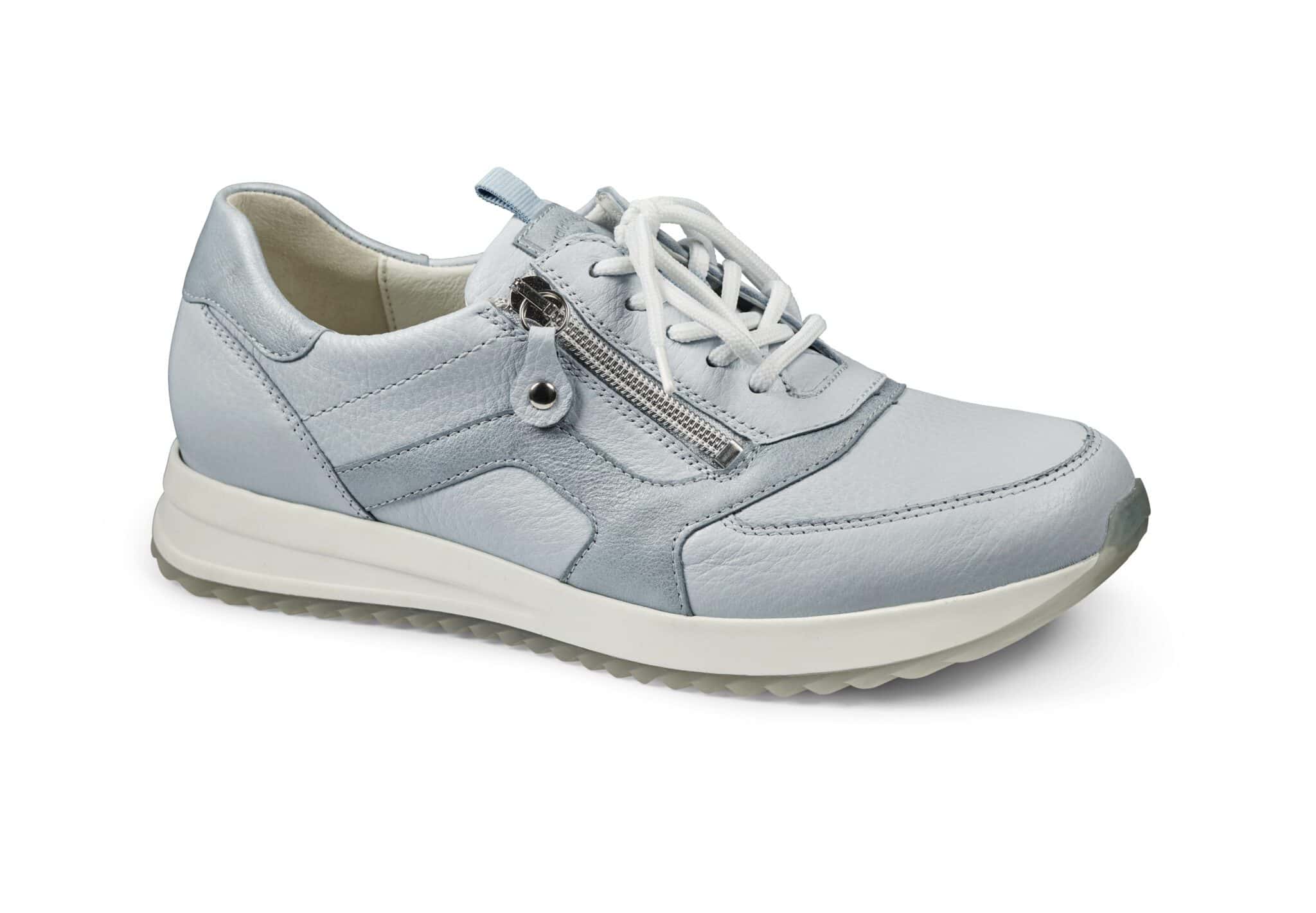 Dam sneakers i ljusblått med zipp och snörning.