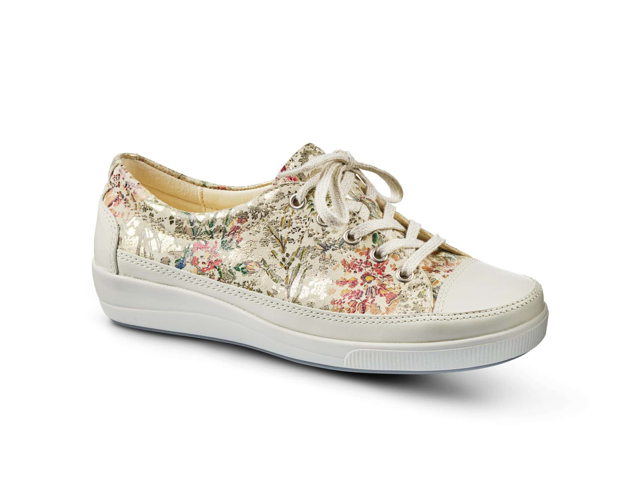 Dam sneakers med blommigt mönster och vit sula.