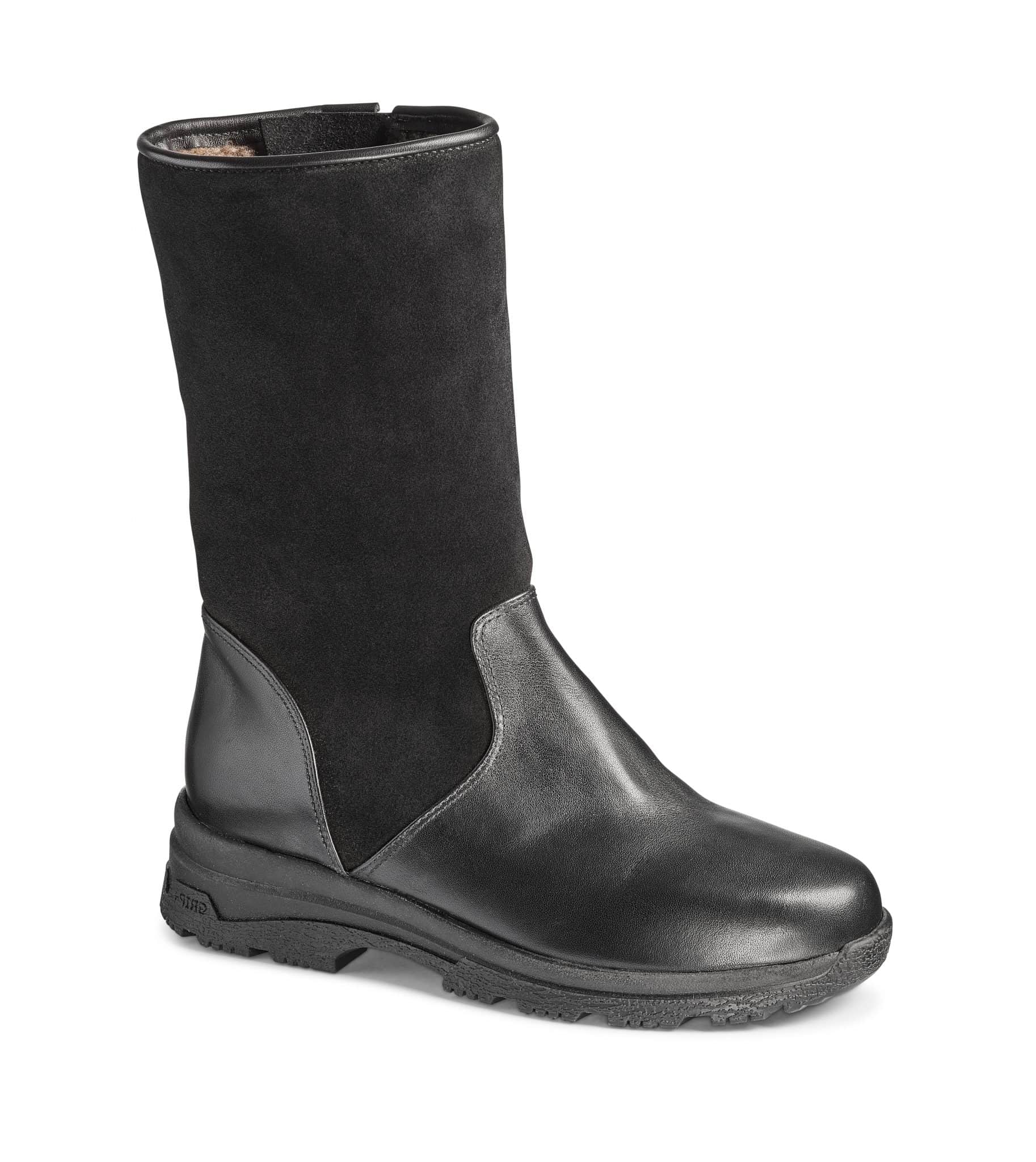 Lång svart vinterstövel med slitstark sula och komfortabel design för kalla dagar.