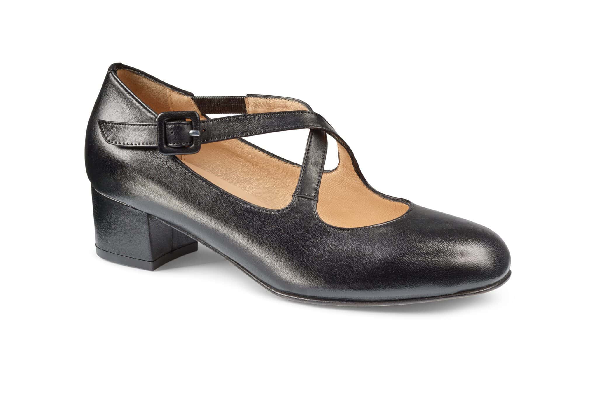 Svart damklack med T-straps och låg klack, elegant och bekväm för vardag och fest.