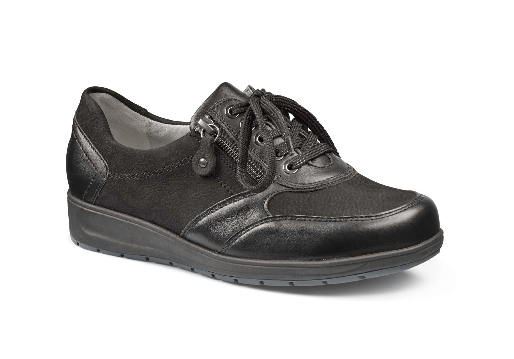 Svart bekväm damkänga i skinn med gummisula för vardagsbruk.