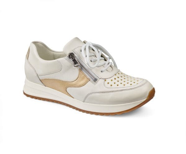 Vit och beige dam sneakers med zipp och perforerade detaljer.