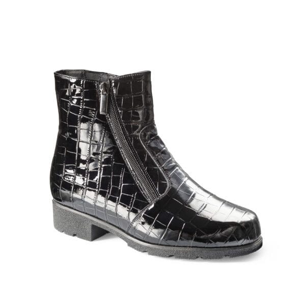 Svart läderstövel med krokodilmönster och dragkedja, dammodell.