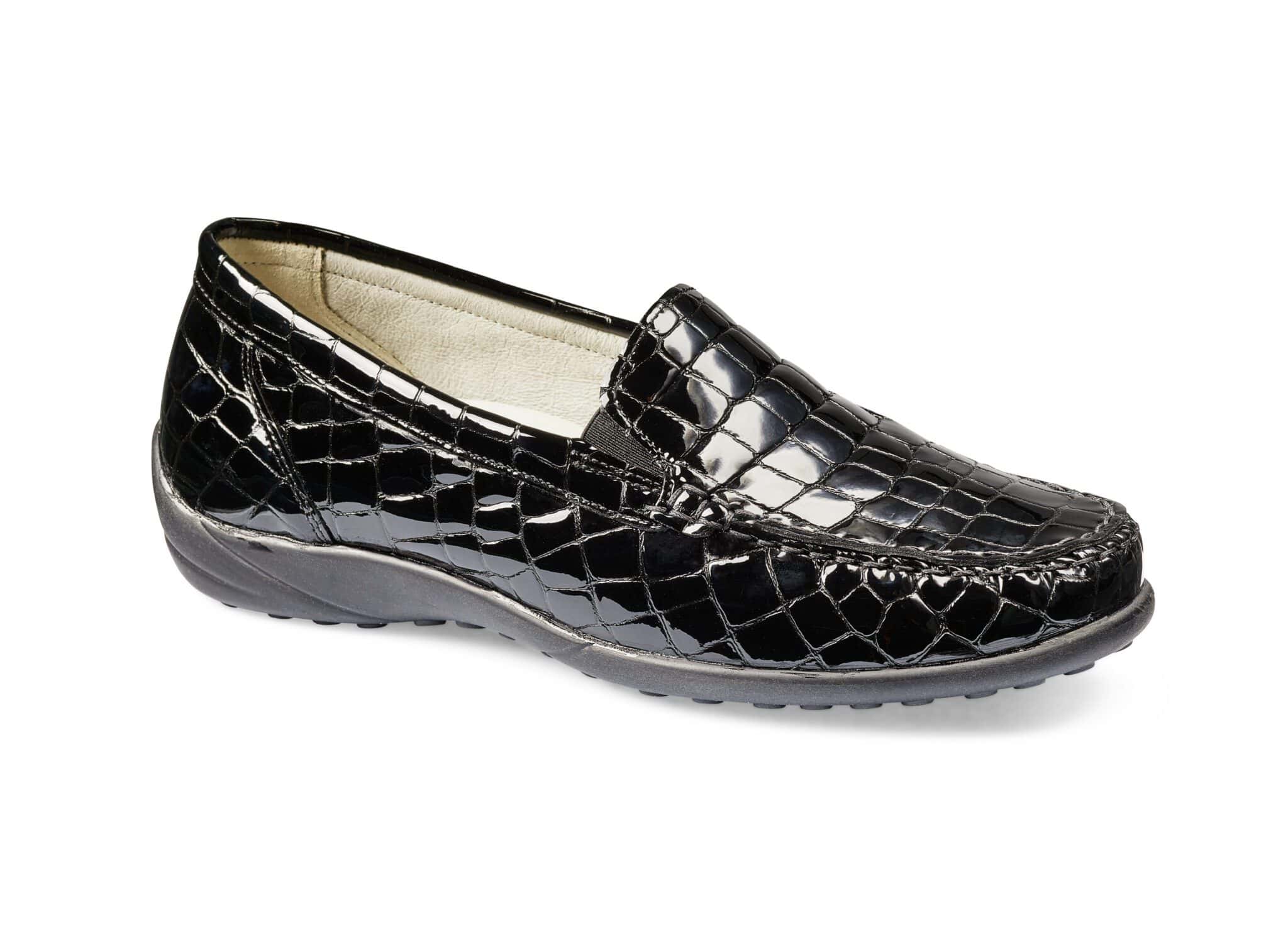 Skinnskor i svart krokodilmönster med bekväm passform för kvinnor.
